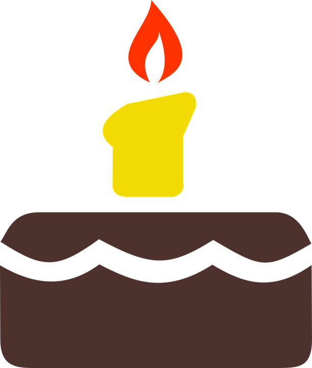 A picture of a birthday cake with one candle